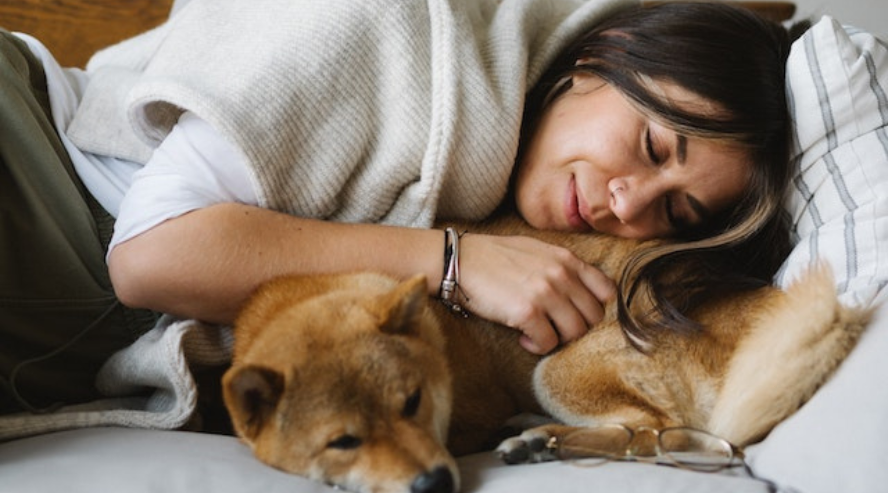 Is it healthy to allow your dogs to sleep with you?